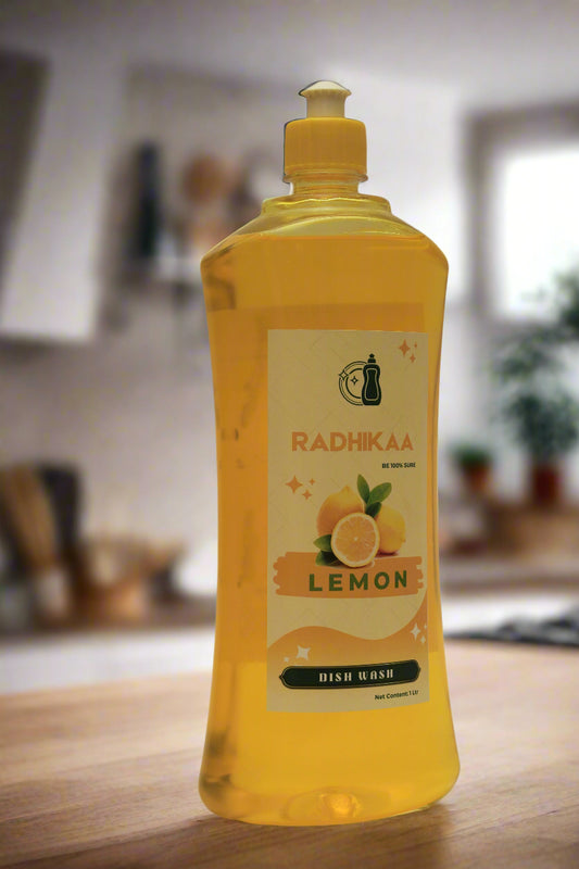 Yellow bottle of dishwashing liquid with lemon flavor on a white background